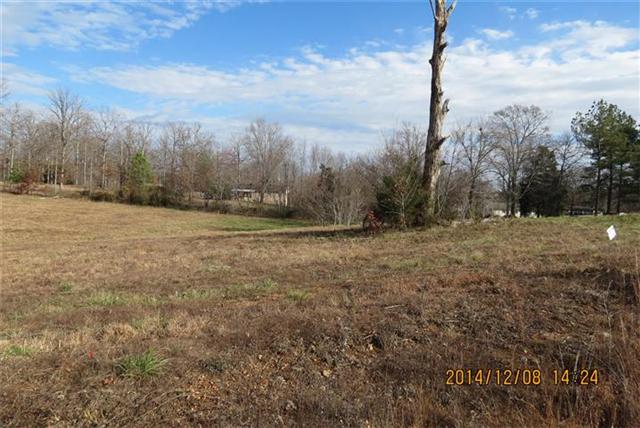 0.96 Acre lot with city water and city sewer in small subdivision.