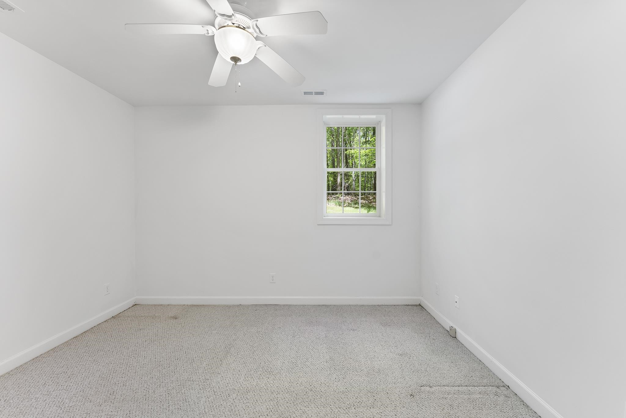 9436 Macon Road Raleigh, NC 27613 - Photo 33 of 37 5th bedroom is in basement . Basement also has full bathroom. Bedroom