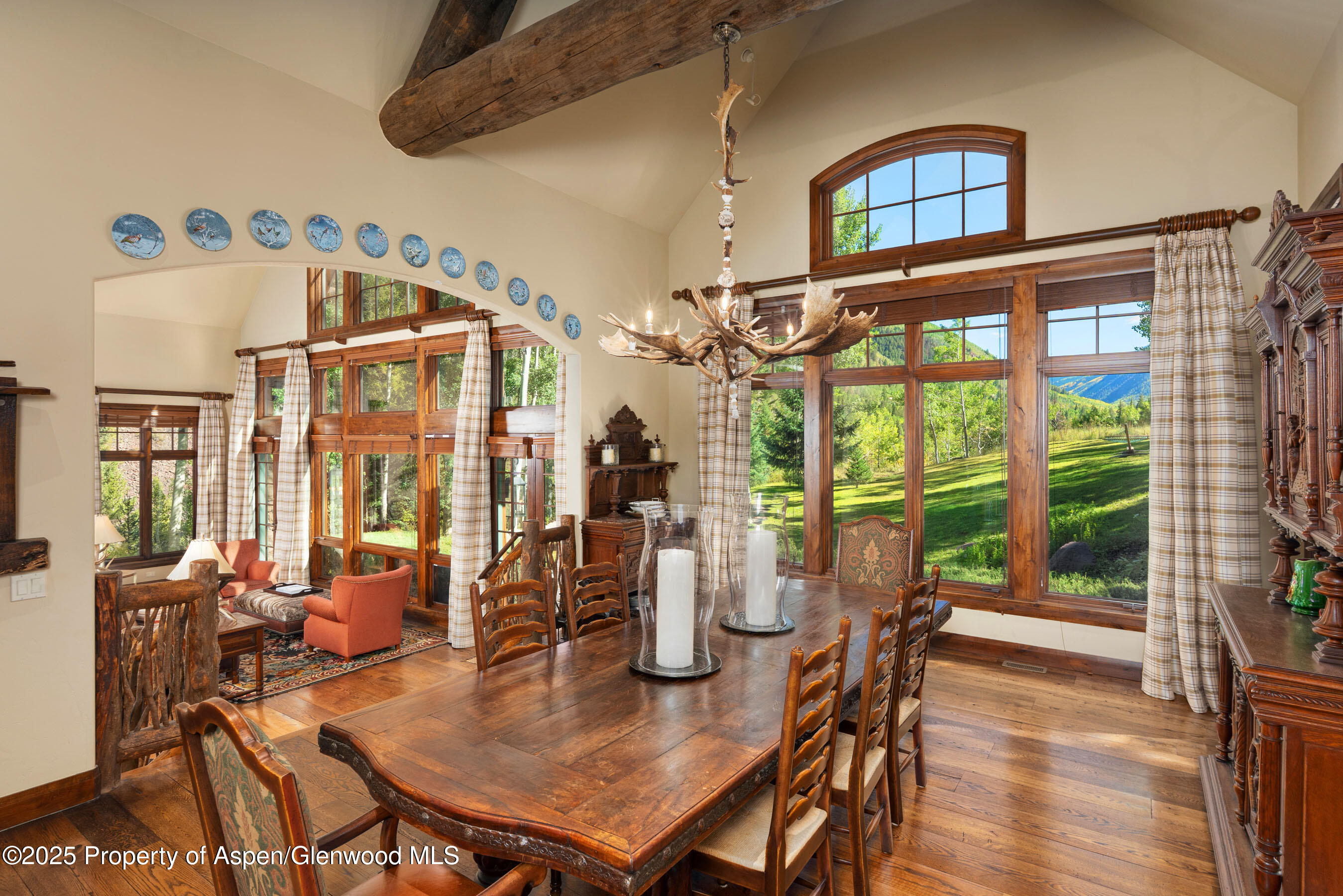 800 South Hayden Road Aspen, CO 81611 - Photo 18 of 60 a view of a dining room with furniture window and outside view