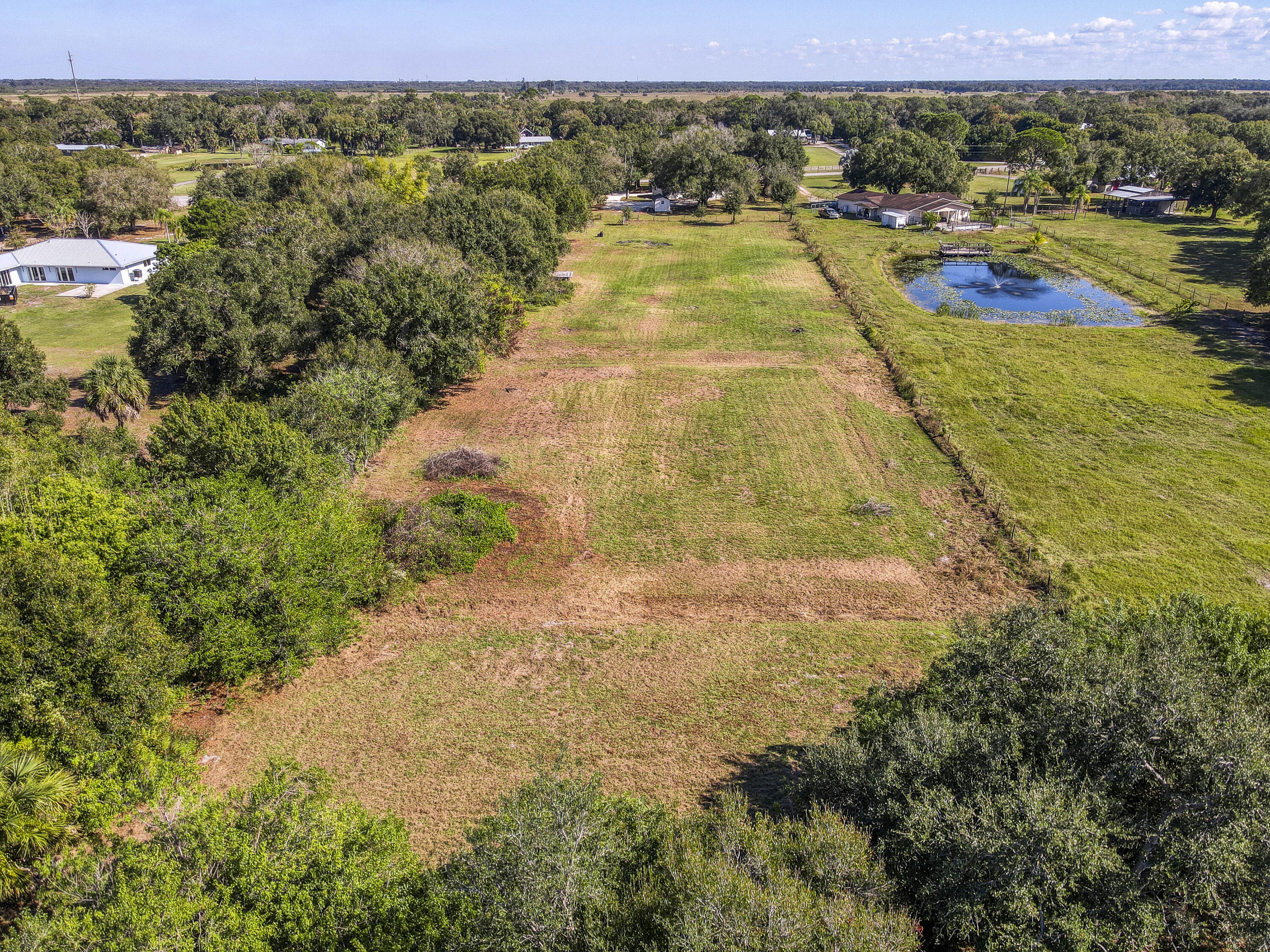 311 Southwest 67th Drive Okeechobee, FL 34974 - Photo 30 of 30 a view of a yard with an outdoor space