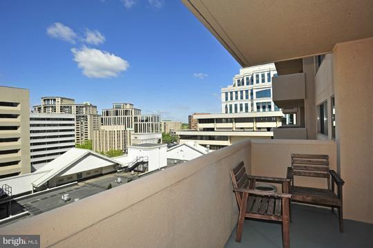 1301 North Courthouse Road, Unit 1507 Arlington, VA 22201 - Photo 14 of 16 a view of a kitchen with furniture and stove