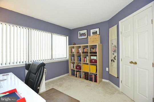 1301 North Courthouse Road, Unit 1507 Arlington, VA 22201 - Photo 10 of 16 a living room with furniture and a window