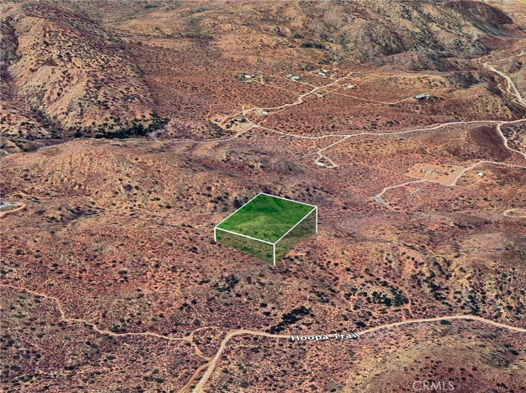0 Hoopa Road Yucca Valley, CA 92284 - Photo 1 of 1 a view of a backyard with large trees