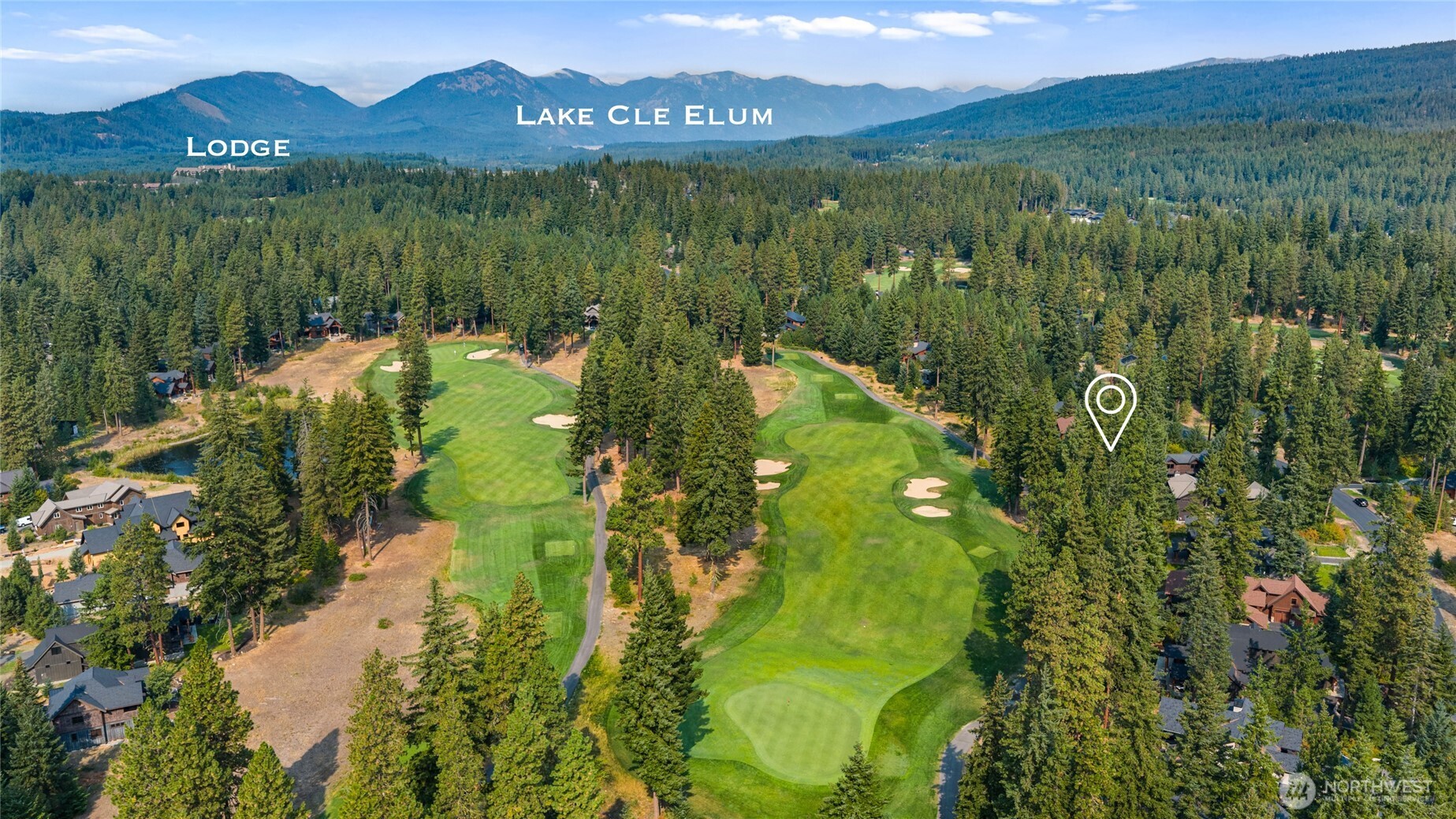 530 Spragger Way Cle Elum, WA 98922 - Photo 38 of 40 a view of a lake with a mountain in the background