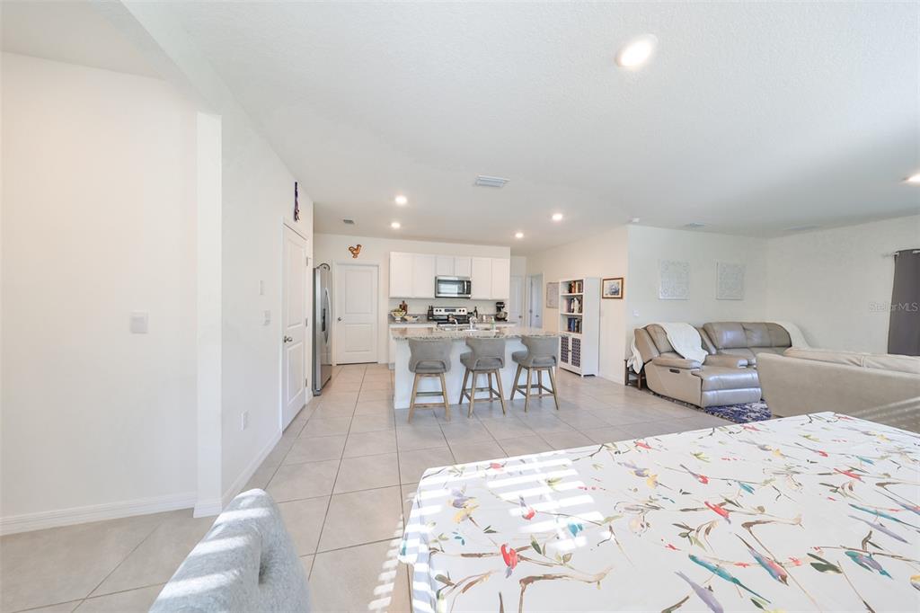 3528 Maple Grv Way Plant City, FL 33565 - Photo 14 of 51 a living room with furniture and view of kitchen