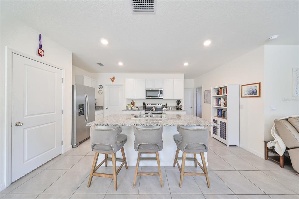 3528 Maple Grv Way Plant City, FL 33565 - Photo 15 of 51 a view of a dining room with furniture