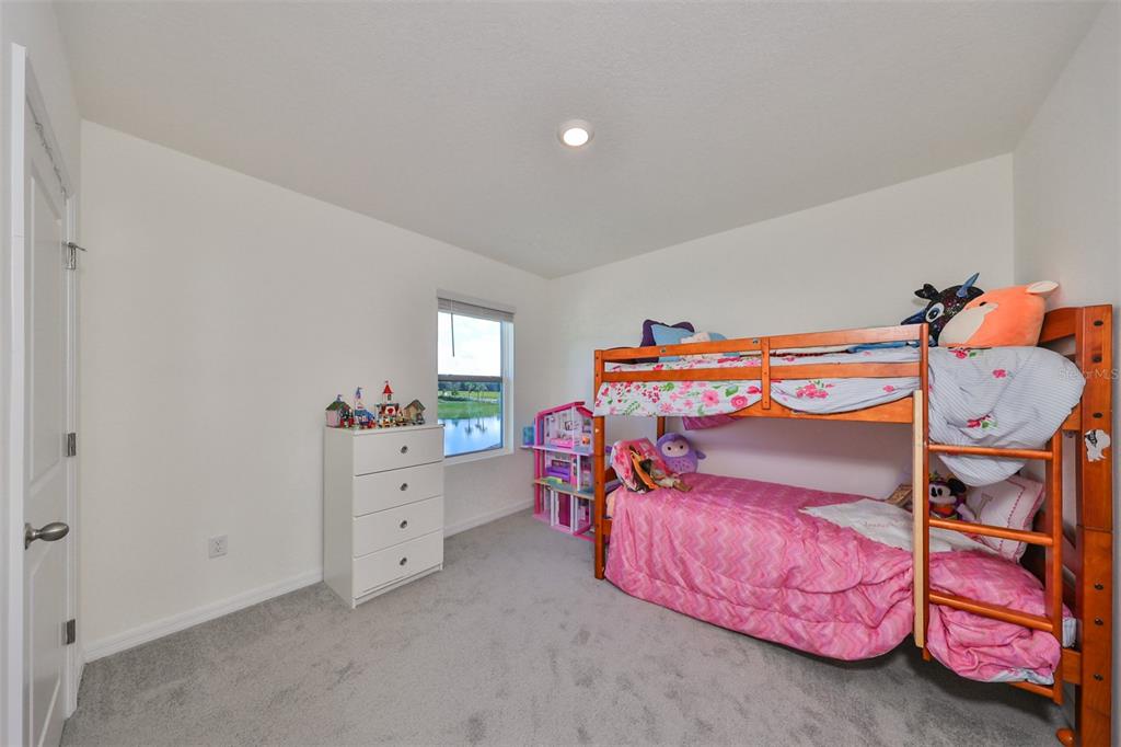 3528 Maple Grv Way Plant City, FL 33565 - Photo 31 of 51 a bedroom with a bed and window