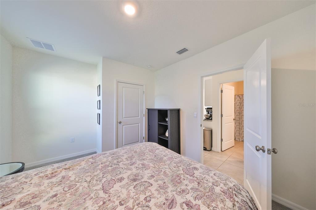 3528 Maple Grv Way Plant City, FL 33565 - Photo 38 of 51 a view of a bedroom with closet and bathroom