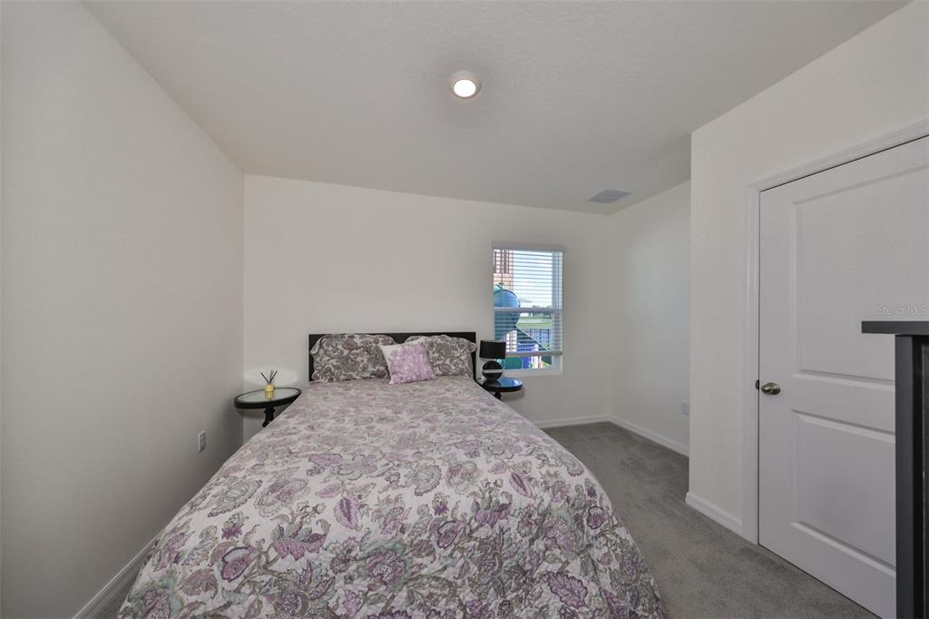 3528 Maple Grv Way Plant City, FL 33565 - Photo 40 of 51 a bedroom with a bed and a window