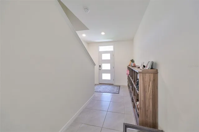 a view of hallway with a window