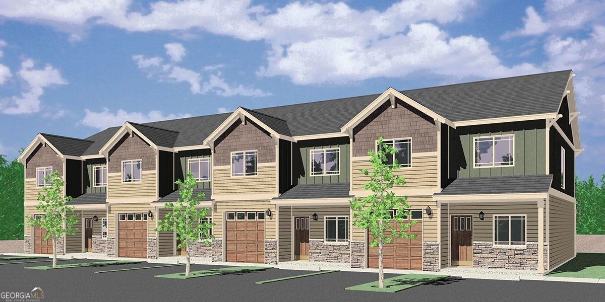 310 Beau Claire Circle Byron, GA 31008 - Photo 1 of 1 a front view of a house with a yard and garage