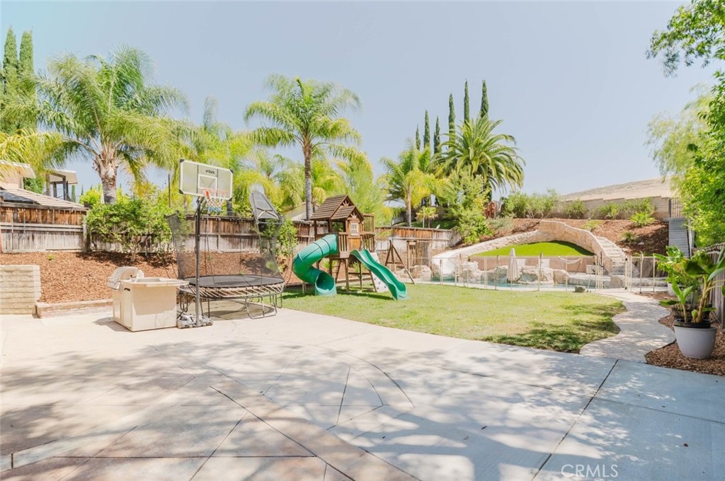 32480 The Old Road Castaic, CA 91384 - Photo 53 of 68 a view of a park with a slide and table
