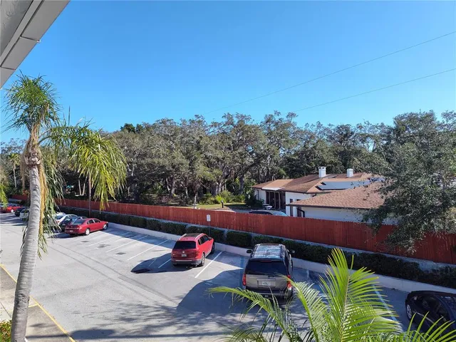 a view of a chairs and table in the patio