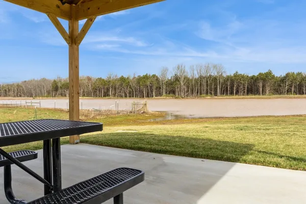 a view of a building with a yard