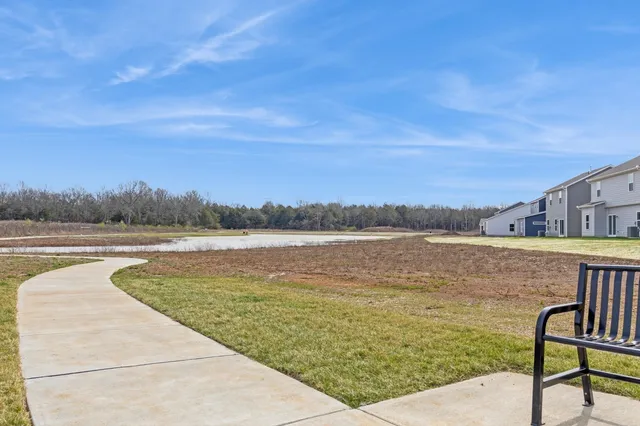 a view of a park with a slide