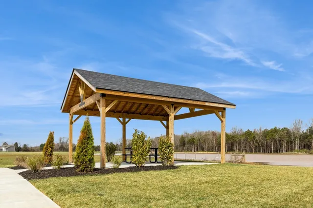 a view of a swimming pool with a patio