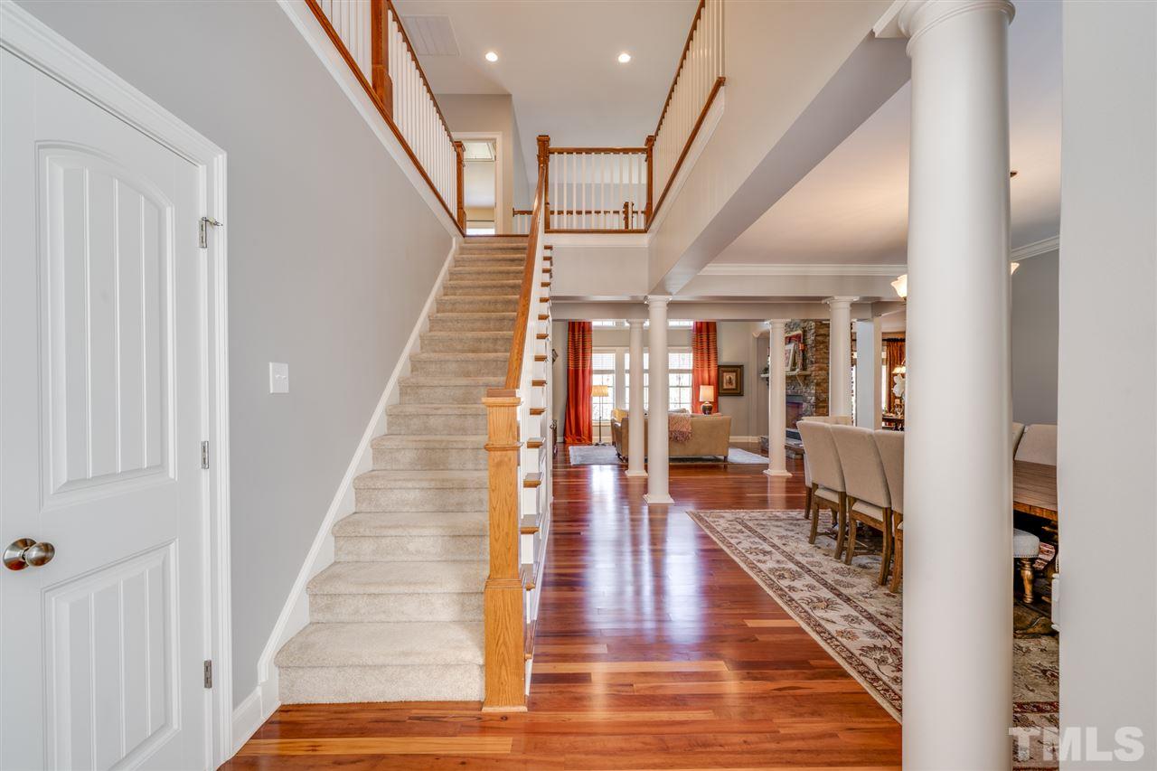 12819 Edsel Drive Raleigh, NC 27613 - Photo 2 of 30 a view of entryway and hall with wooden floor