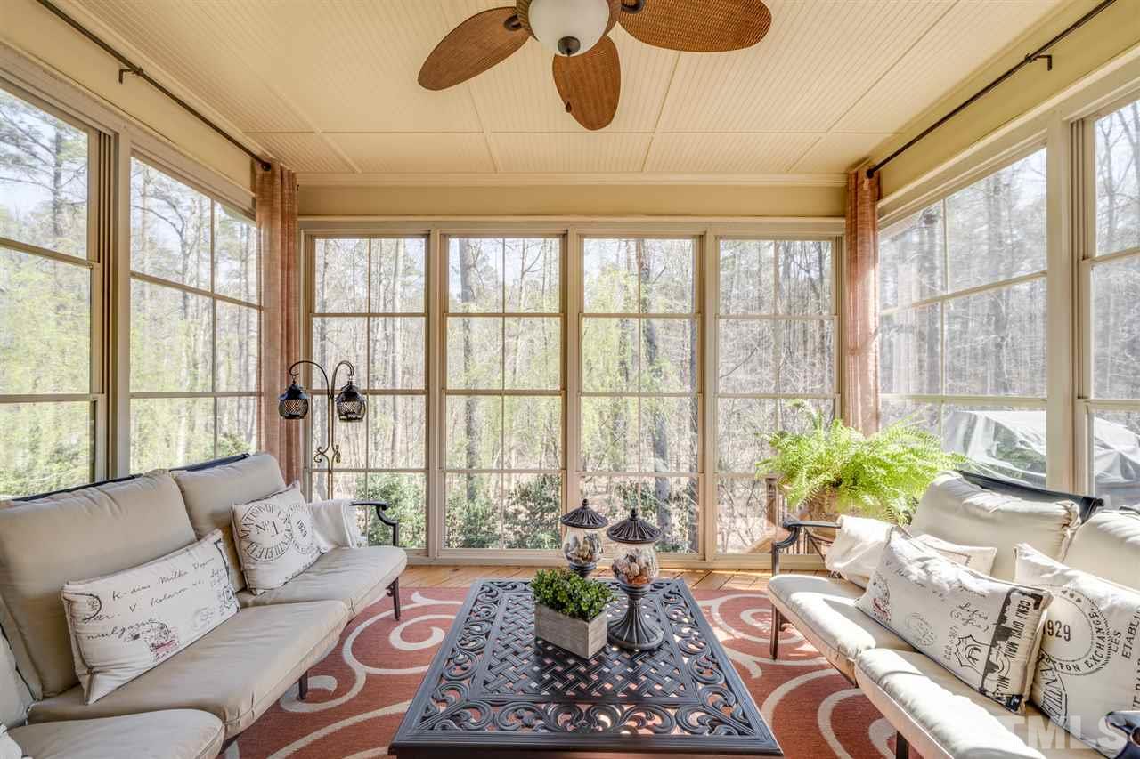 12819 Edsel Drive Raleigh, NC 27613 - Photo 14 of 30 a living room with furniture and a large window