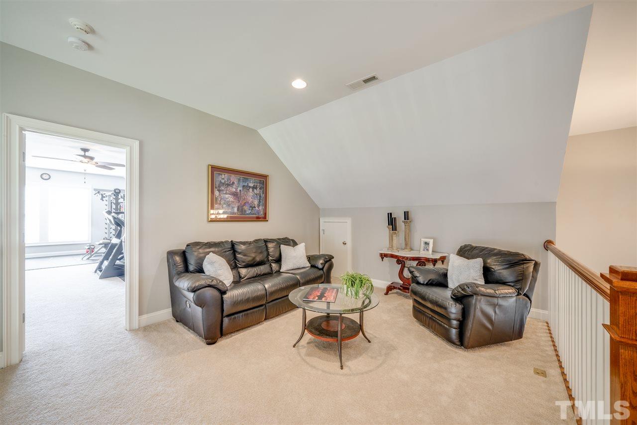 12819 Edsel Drive Raleigh, NC 27613 - Photo 17 of 30 a living room with furniture