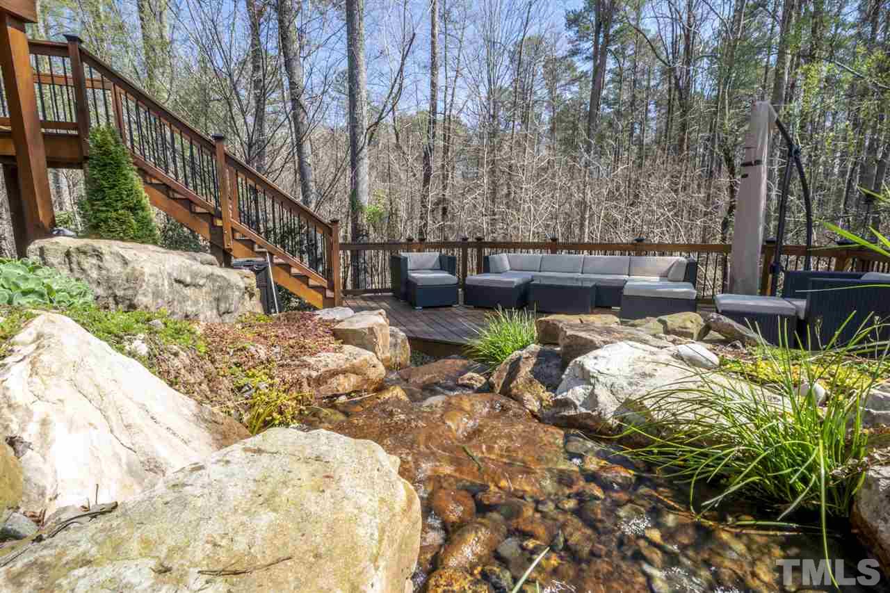 12819 Edsel Drive Raleigh, NC 27613 - Photo 23 of 30 a view of a swimming pool with sitting area and furniture