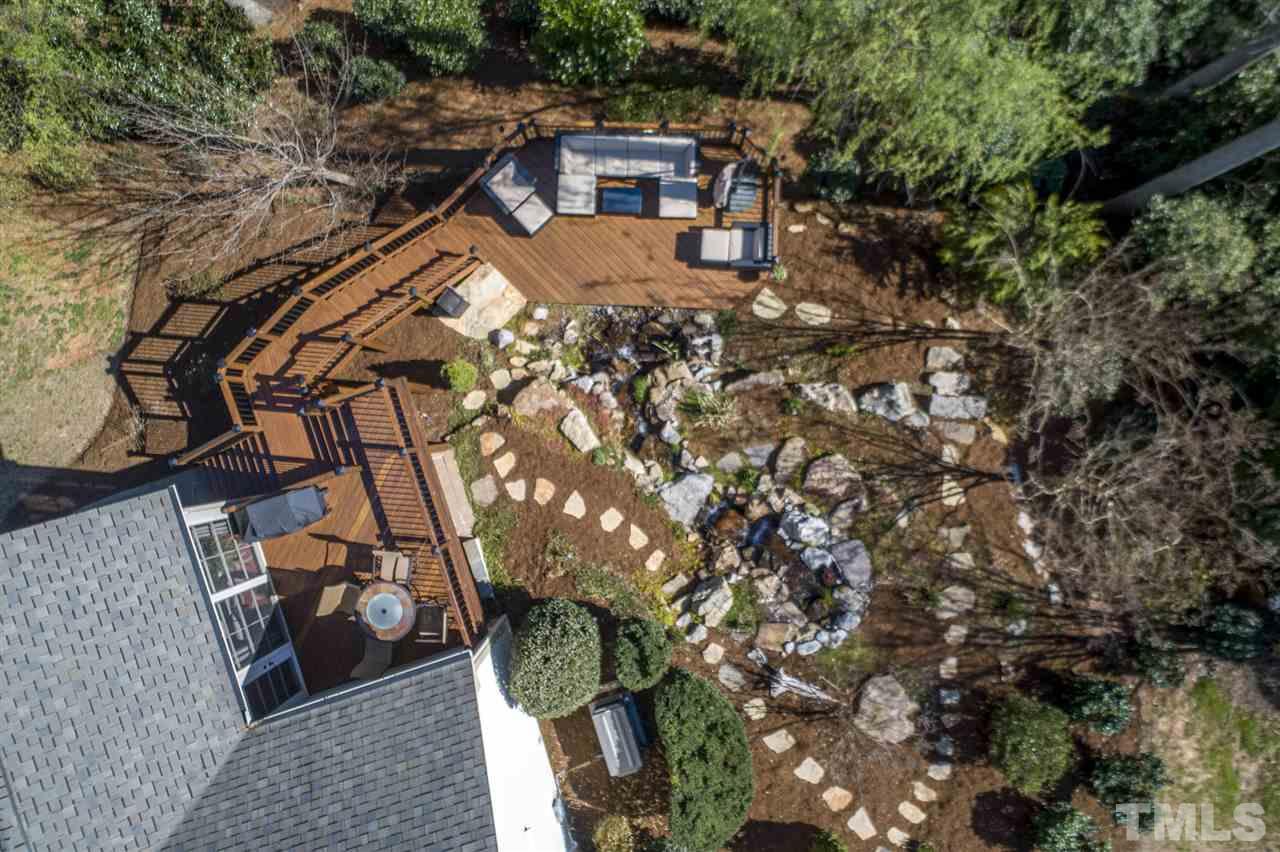 12819 Edsel Drive Raleigh, NC 27613 - Photo 28 of 30 a house view with a backyard space