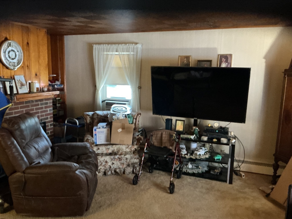 251 Fuller Road Chicopee, MA 01020 - Photo 12 of 19 a living room with furniture and a flat screen tv