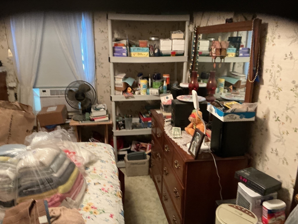 251 Fuller Road Chicopee, MA 01020 - Photo 13 of 19 a living room filled with furniture and a couch