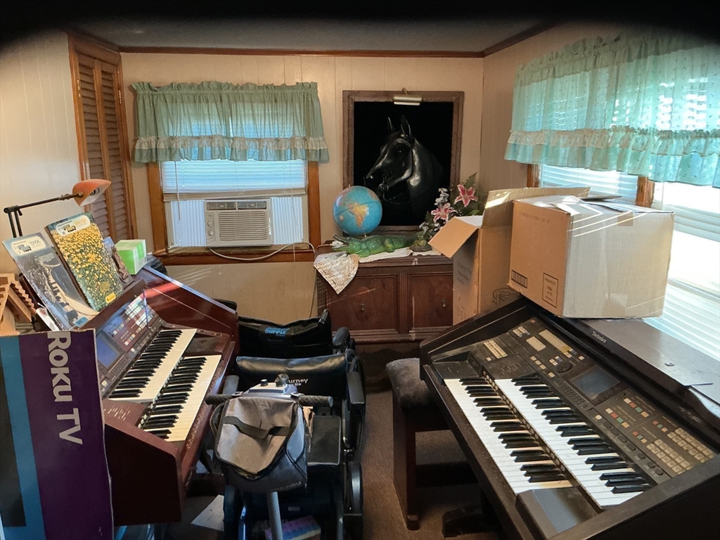 251 Fuller Road Chicopee, MA 01020 - Photo 19 of 19 a living room with furniture and a fireplace