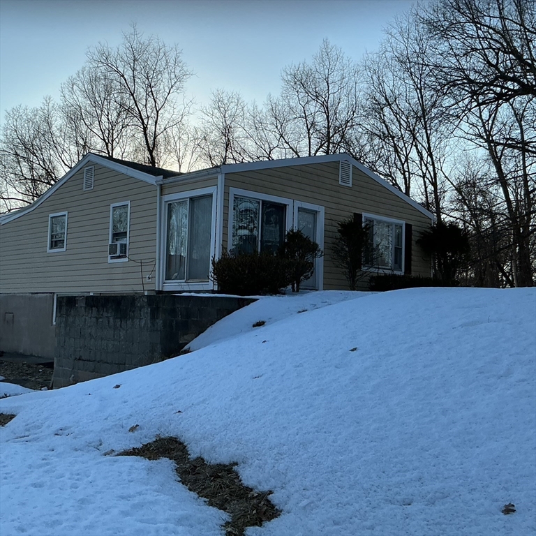 251 Fuller Road Chicopee, MA 01020 - Photo 4 of 19 a view of house with yard and green space