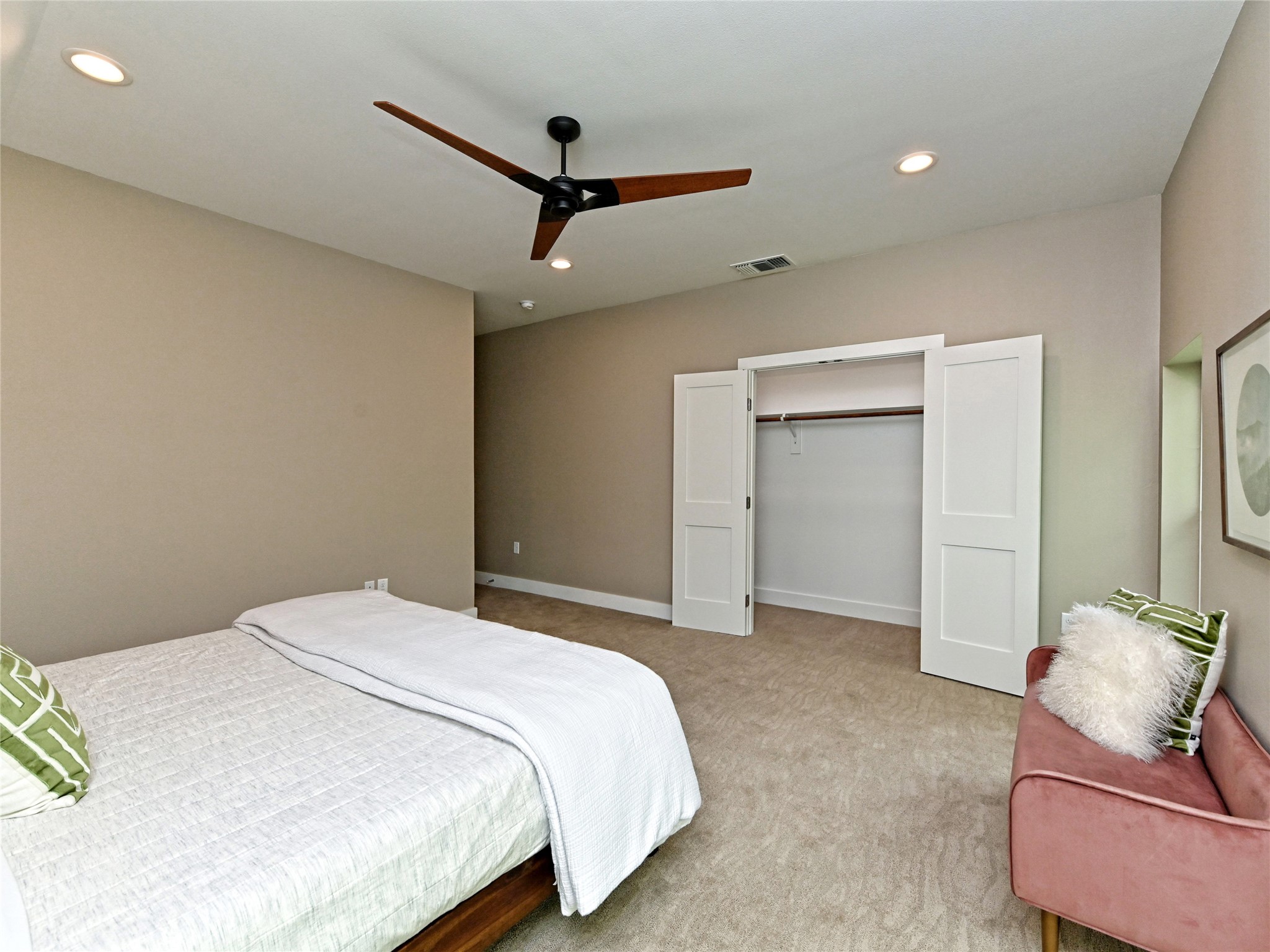 1202 Cometa Street, Unit B Austin, TX 78721 - Photo 14 of 25 a bedroom with a bed and furniture