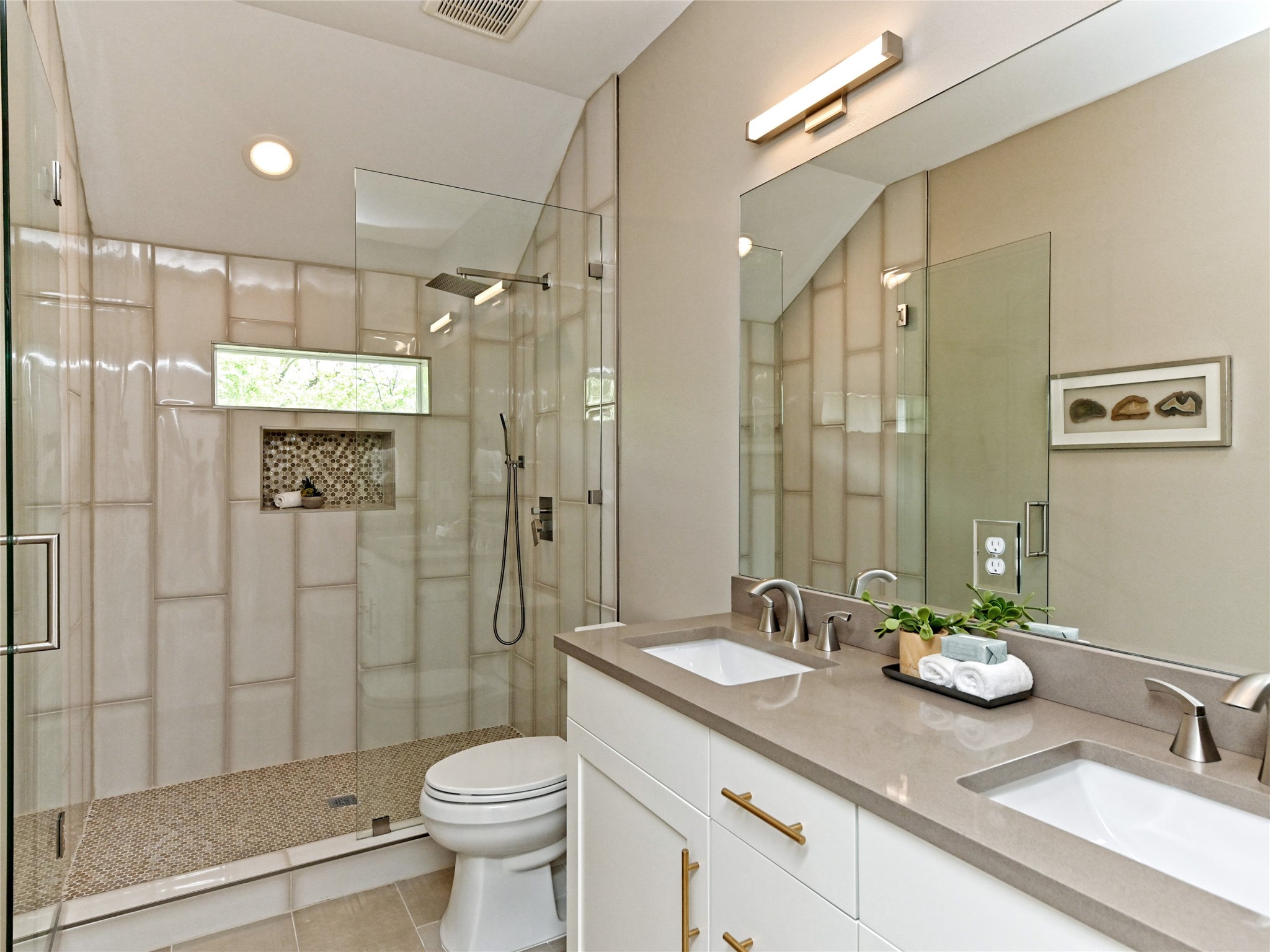 1202 Cometa Street, Unit B Austin, TX 78721 - Photo 15 of 25 a bathroom with a granite countertop sink toilet and shower