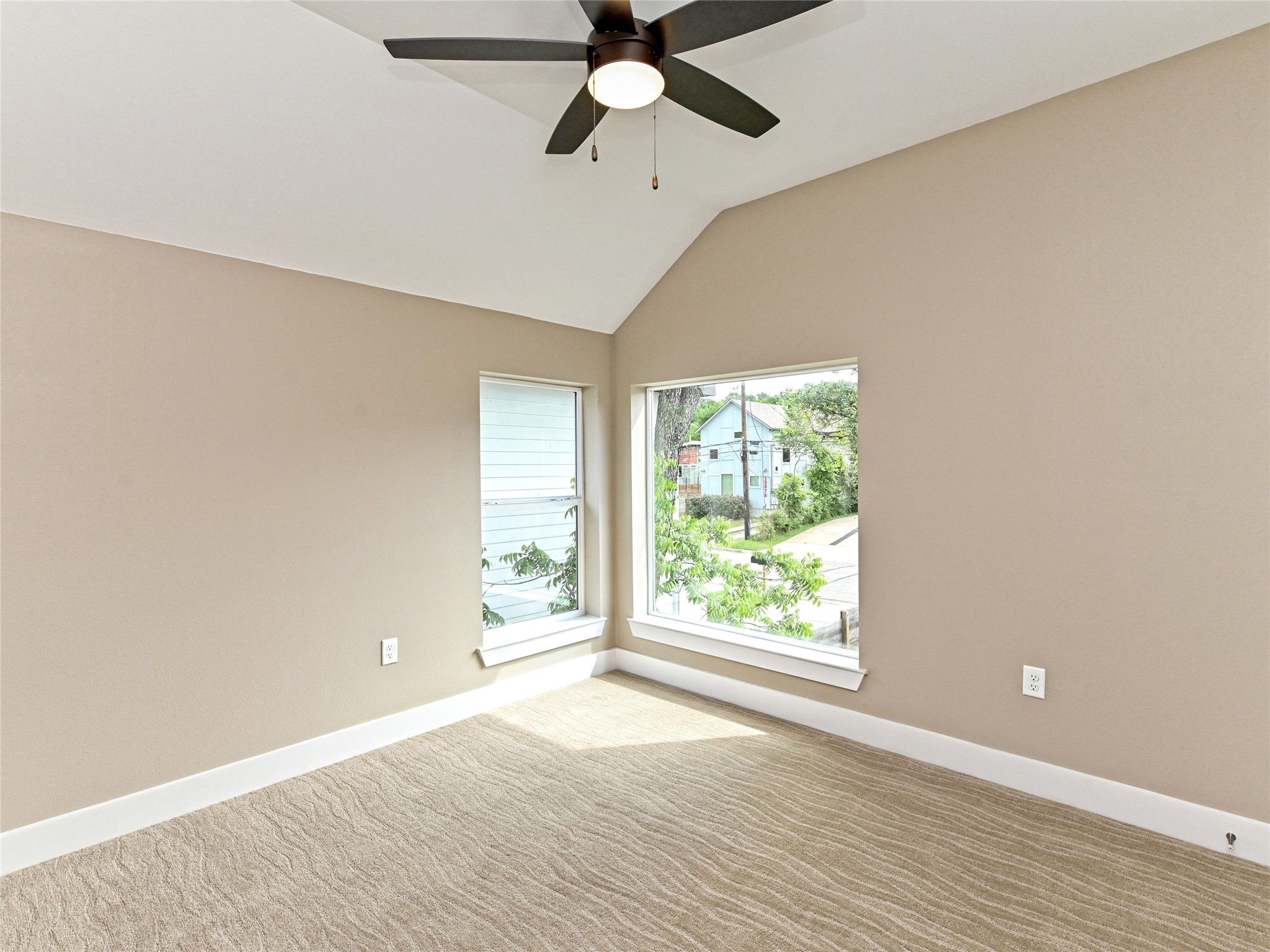 1202 Cometa Street, Unit B Austin, TX 78721 - Photo 17 of 25 a view of an empty room with a window