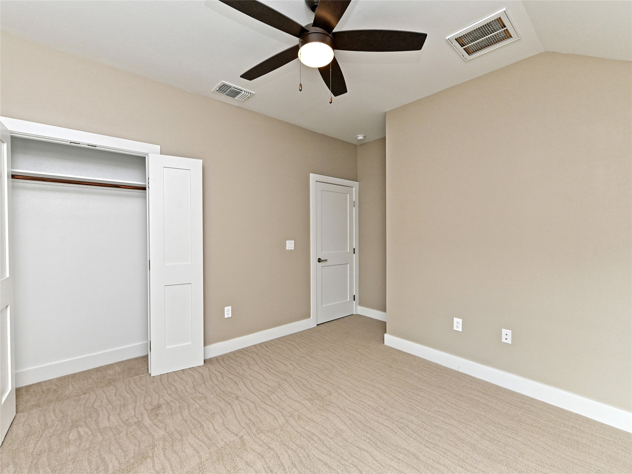 1202 Cometa Street, Unit B Austin, TX 78721 - Photo 18 of 25 an empty room with ceiling fan and window