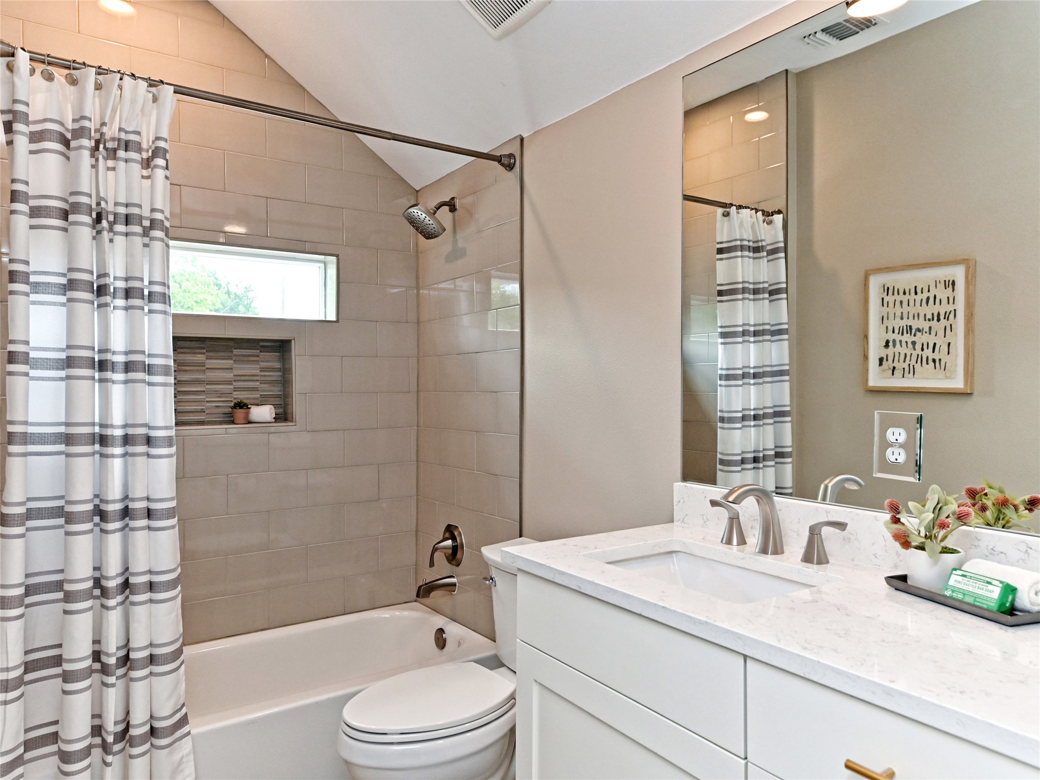 1202 Cometa Street, Unit B Austin, TX 78721 - Photo 19 of 25 a bathroom with a granite countertop sink toilet and shower