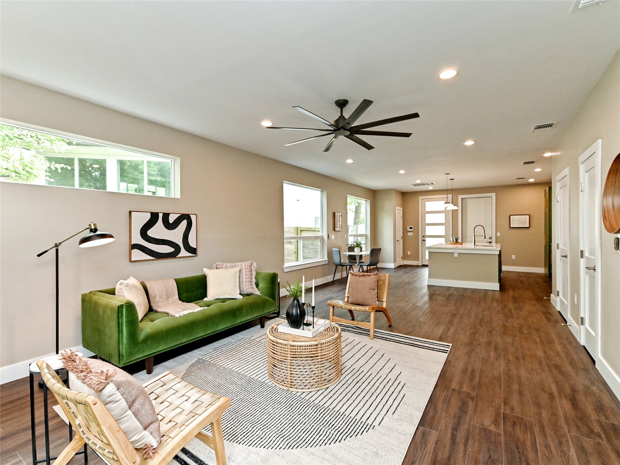 1202 Cometa Street, Unit B Austin, TX 78721 - Photo 5 of 25 a living room with furniture and a wooden floor