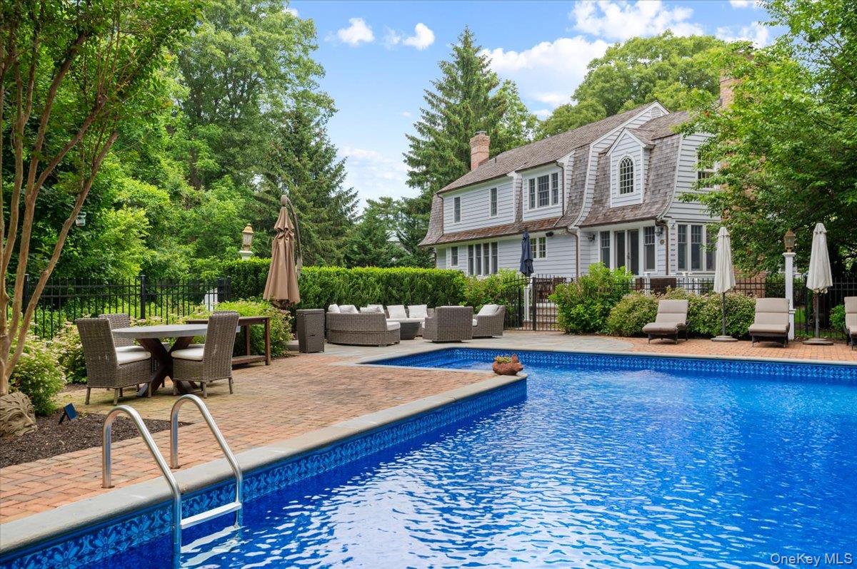 5 Fox Hunt Court Cold Spring Harbor, NY 11724 - Photo 31 of 42 In-ground swimming pool with brick paver surround