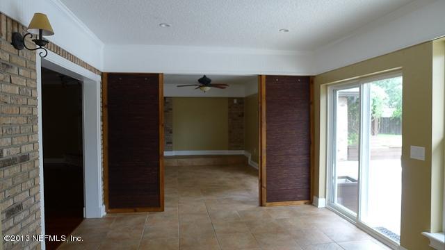 8184 Shady Grove Road Jacksonville, FL 32256 - Photo 30 of 47 SUNROOM W/PARTITION TO DIVIDE ROOM