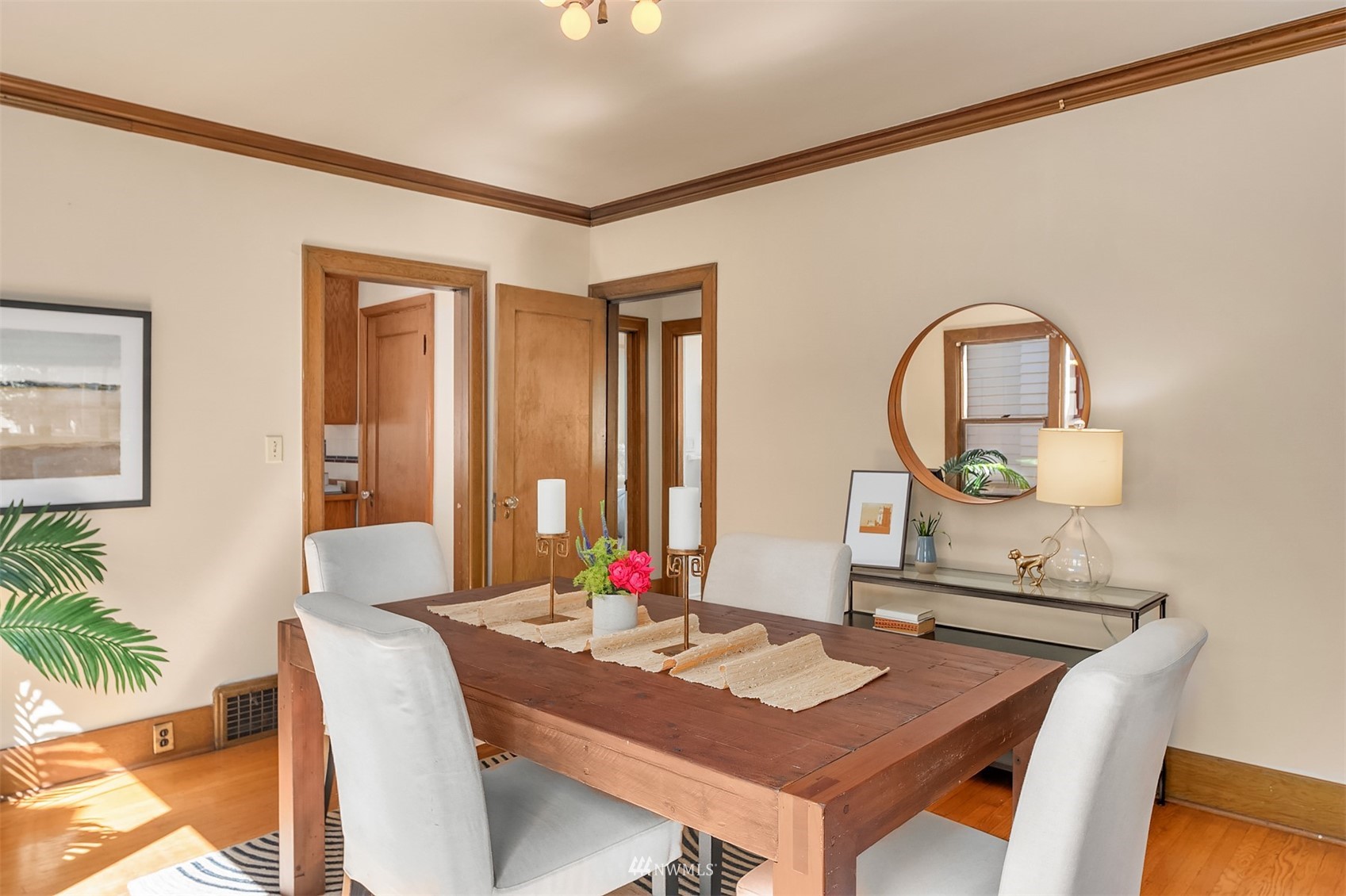 552 North 68th Street Seattle, WA 98103 - Photo 8 of 17 a view of a dining room with furniture and a potted plant