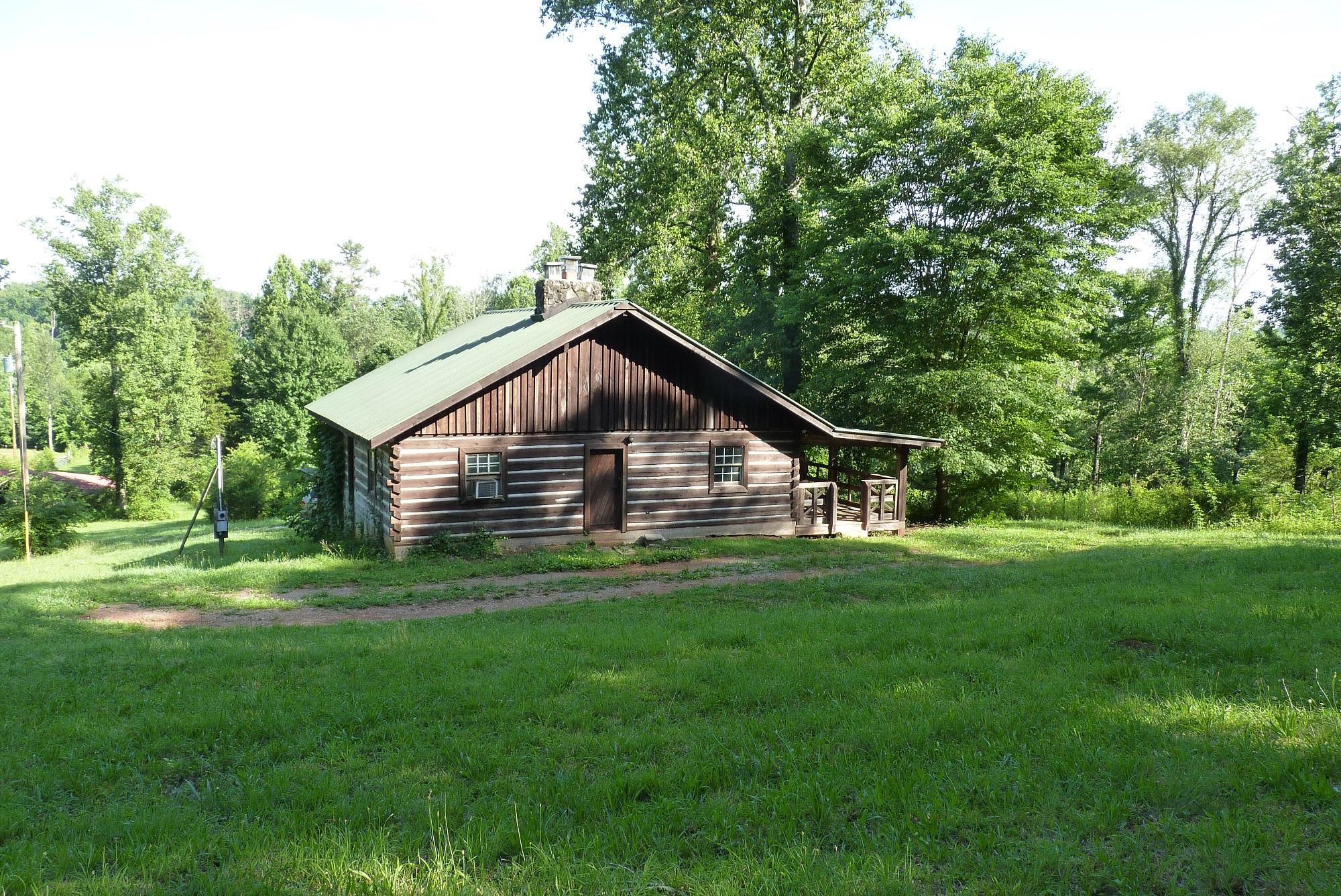 345 Cumberland View Road Clinton, TN 37716 - Photo 1 of 23 a view of a house and a yard