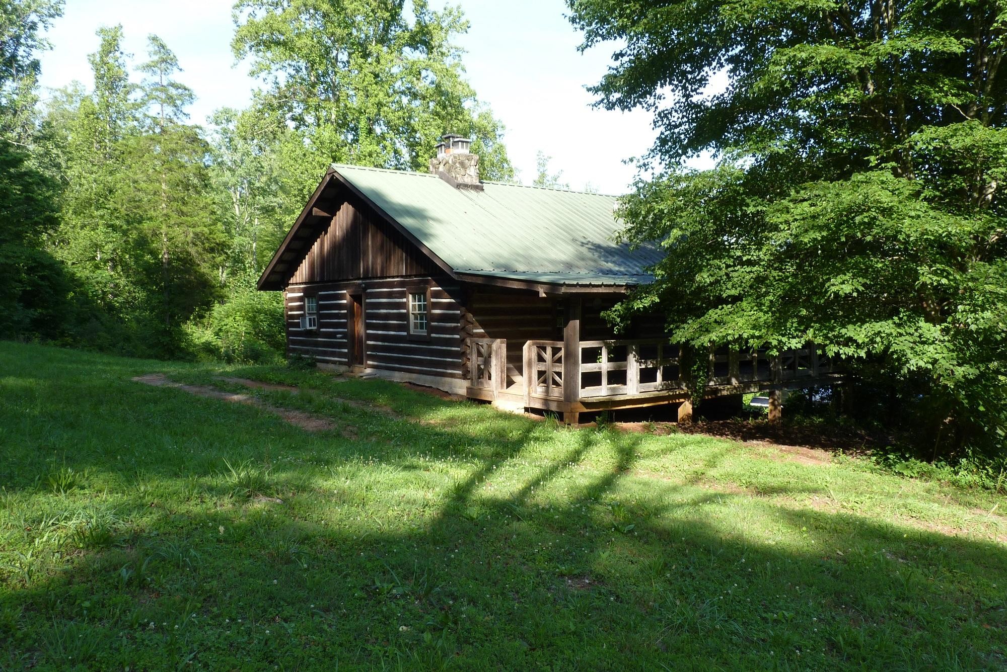 345 Cumberland View Road Clinton, TN 37716 - Photo 3 of 23 a view of a house with backyard and sitting area