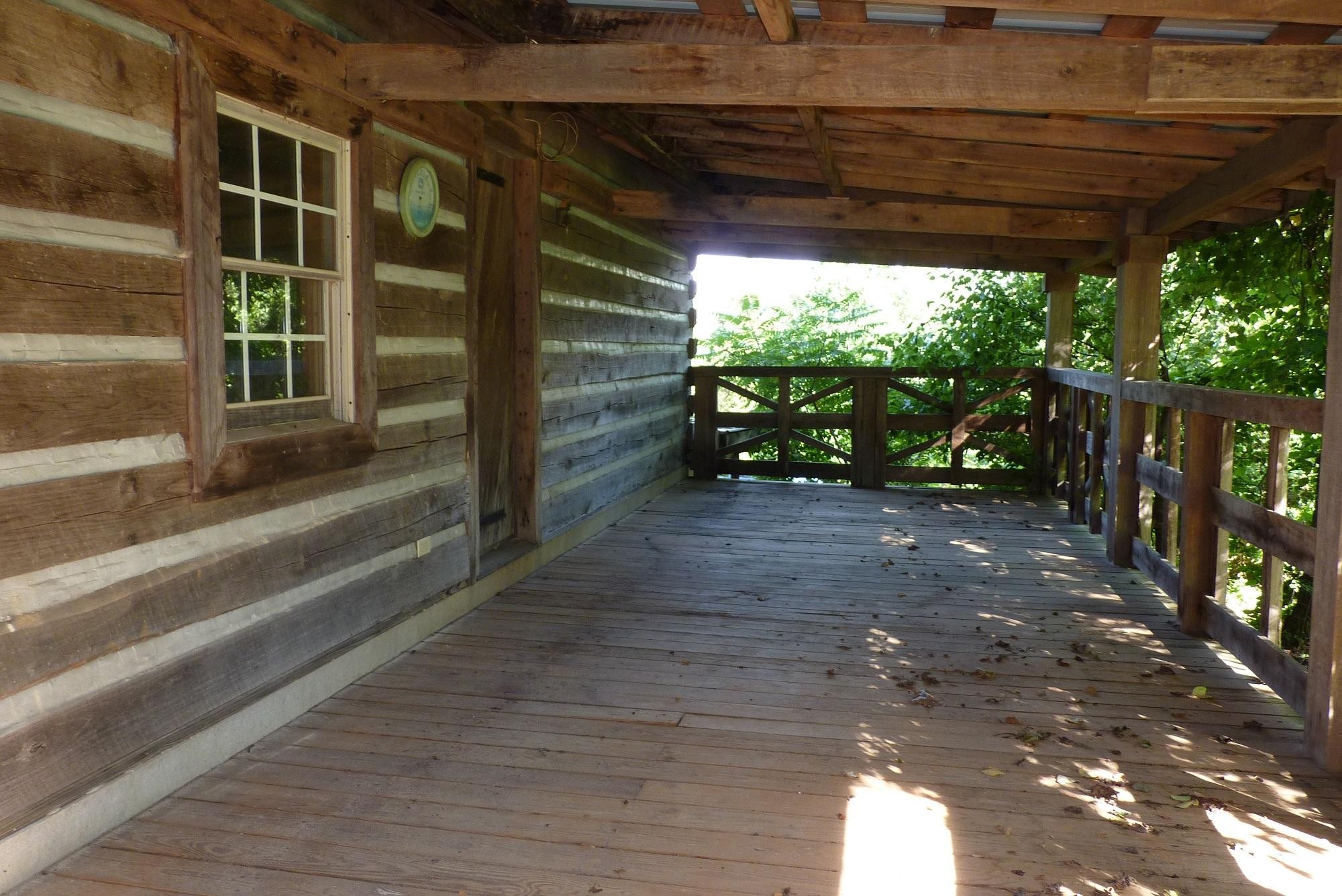 345 Cumberland View Road Clinton, TN 37716 - Photo 5 of 23 a view of a porch with wooden floor