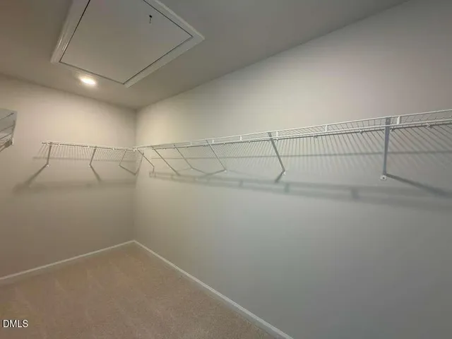 a view of a room with racks on the wall