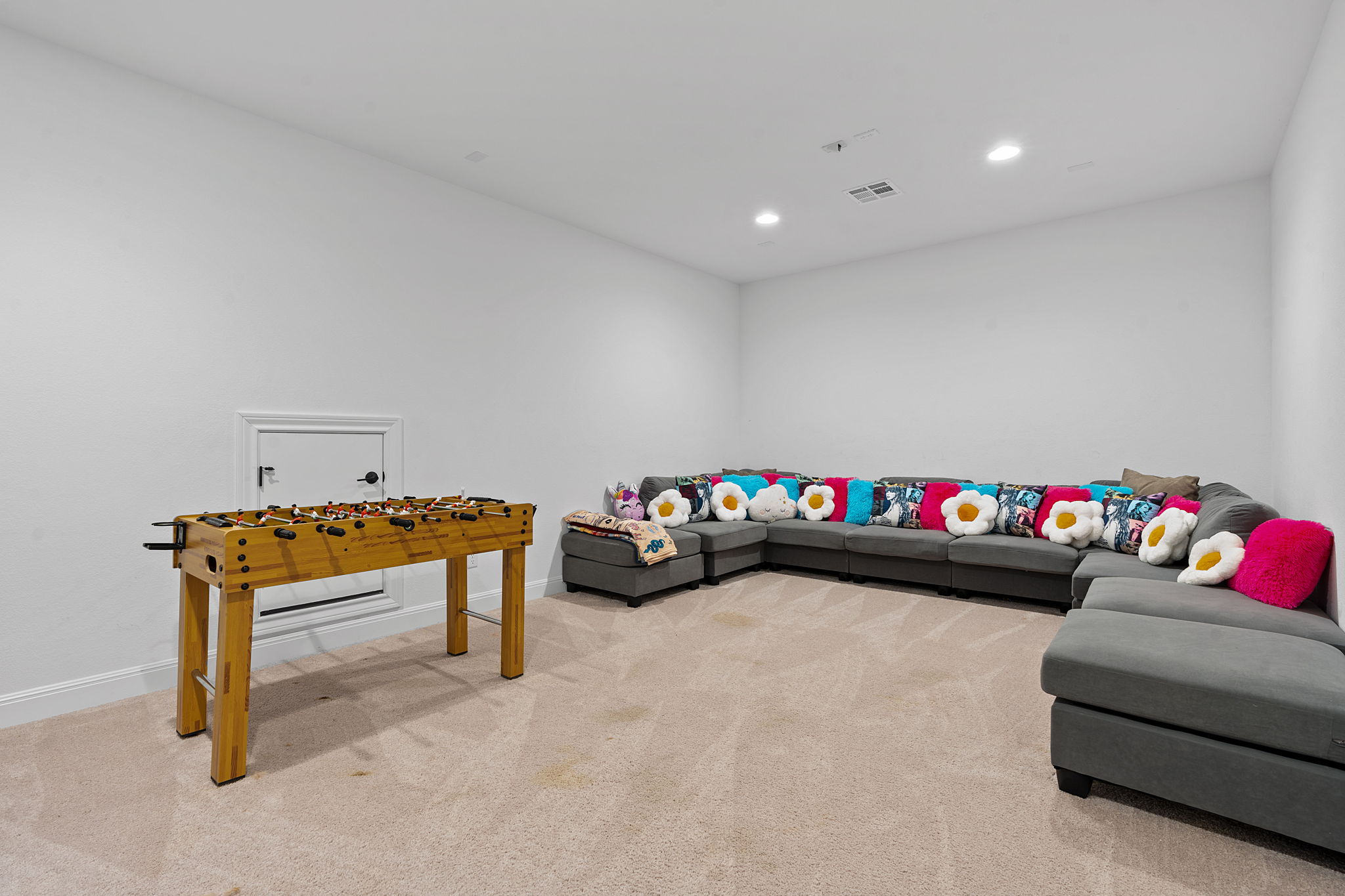 309 Pear Tree Lane Austin, TX 78737 - Photo 20 of 39 a bedroom with furniture and a wooden floor
