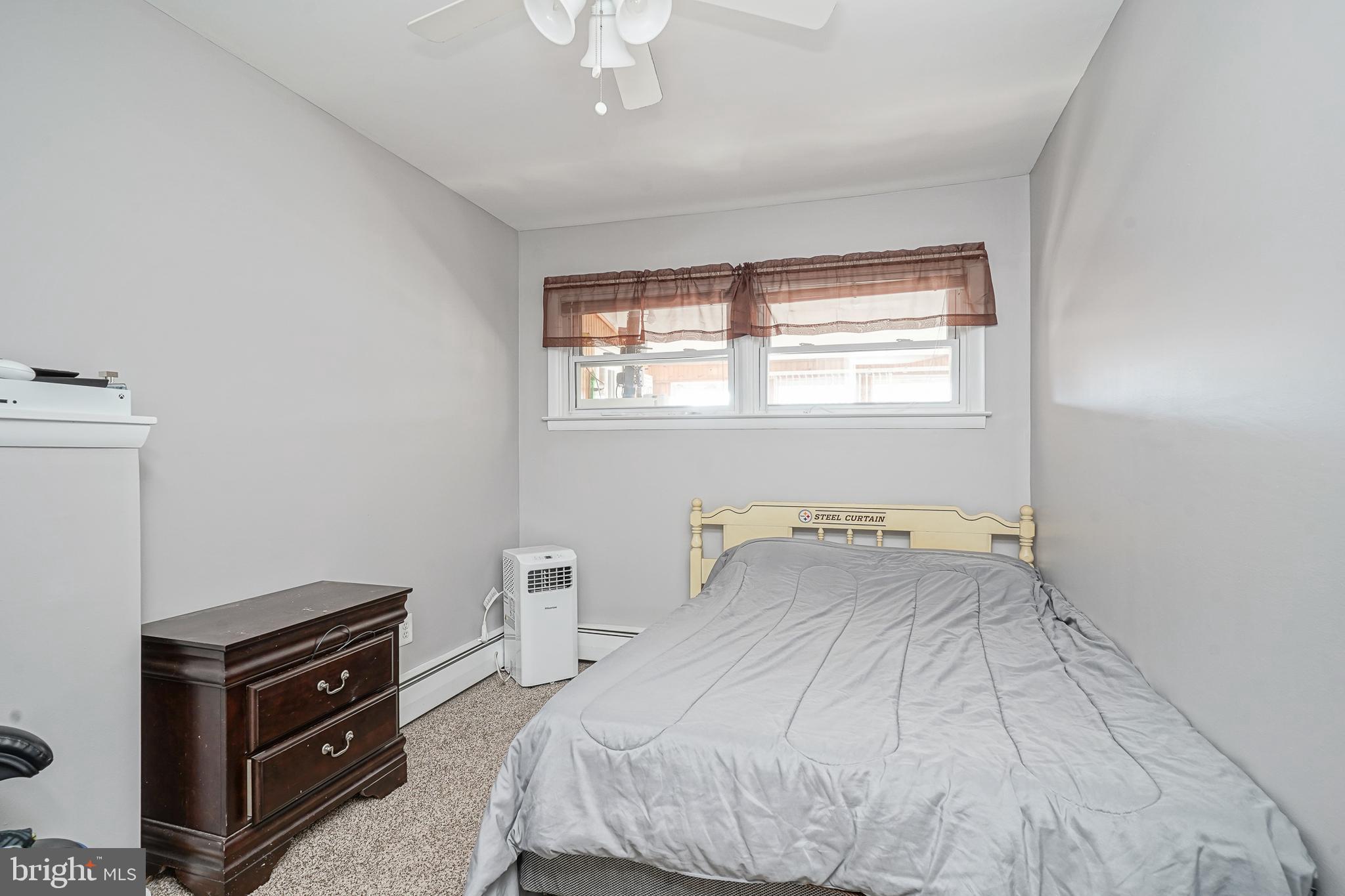 8 Rose Avenue Maple Shade, NJ 08052 - Photo 18 of 26 a bedroom with a bed and a dressers