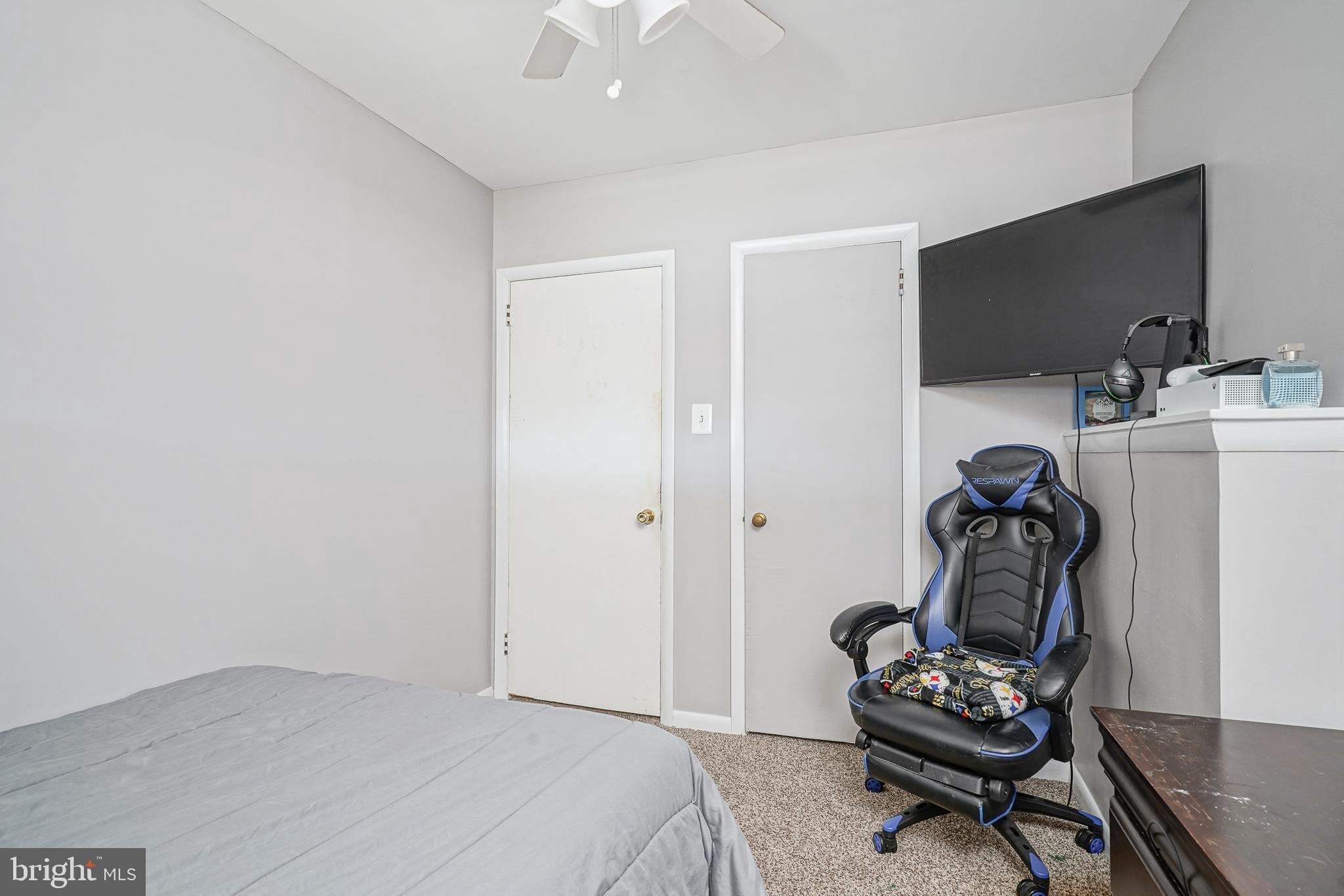 8 Rose Avenue Maple Shade, NJ 08052 - Photo 19 of 26 a bedroom with a bed and a flat screen tv