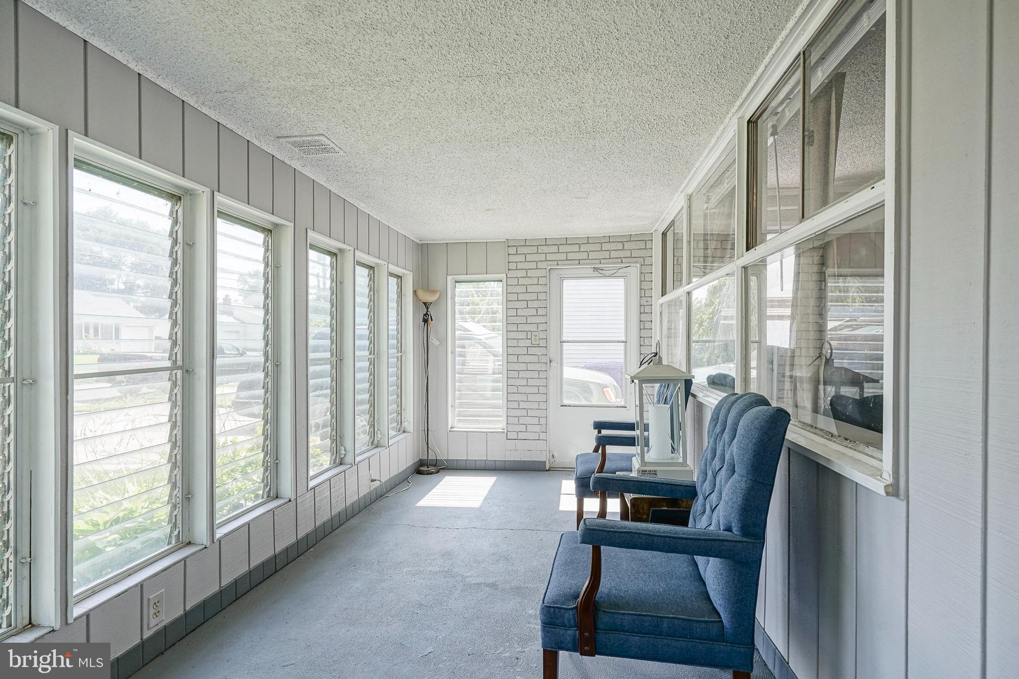 8 Rose Avenue Maple Shade, NJ 08052 - Photo 2 of 26 a living room with furniture and a large window
