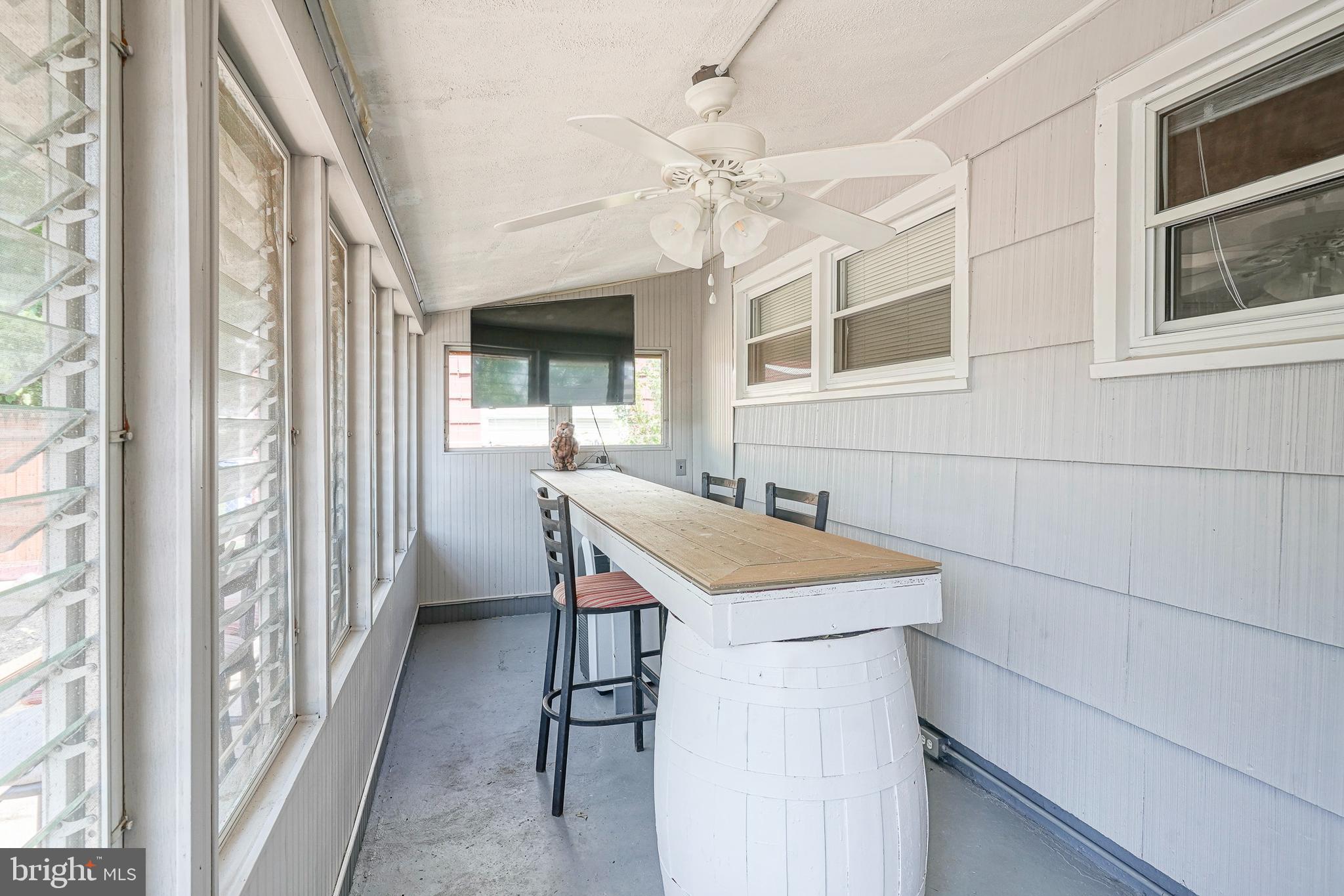 8 Rose Avenue Maple Shade, NJ 08052 - Photo 21 of 26 a room with a table and chairs