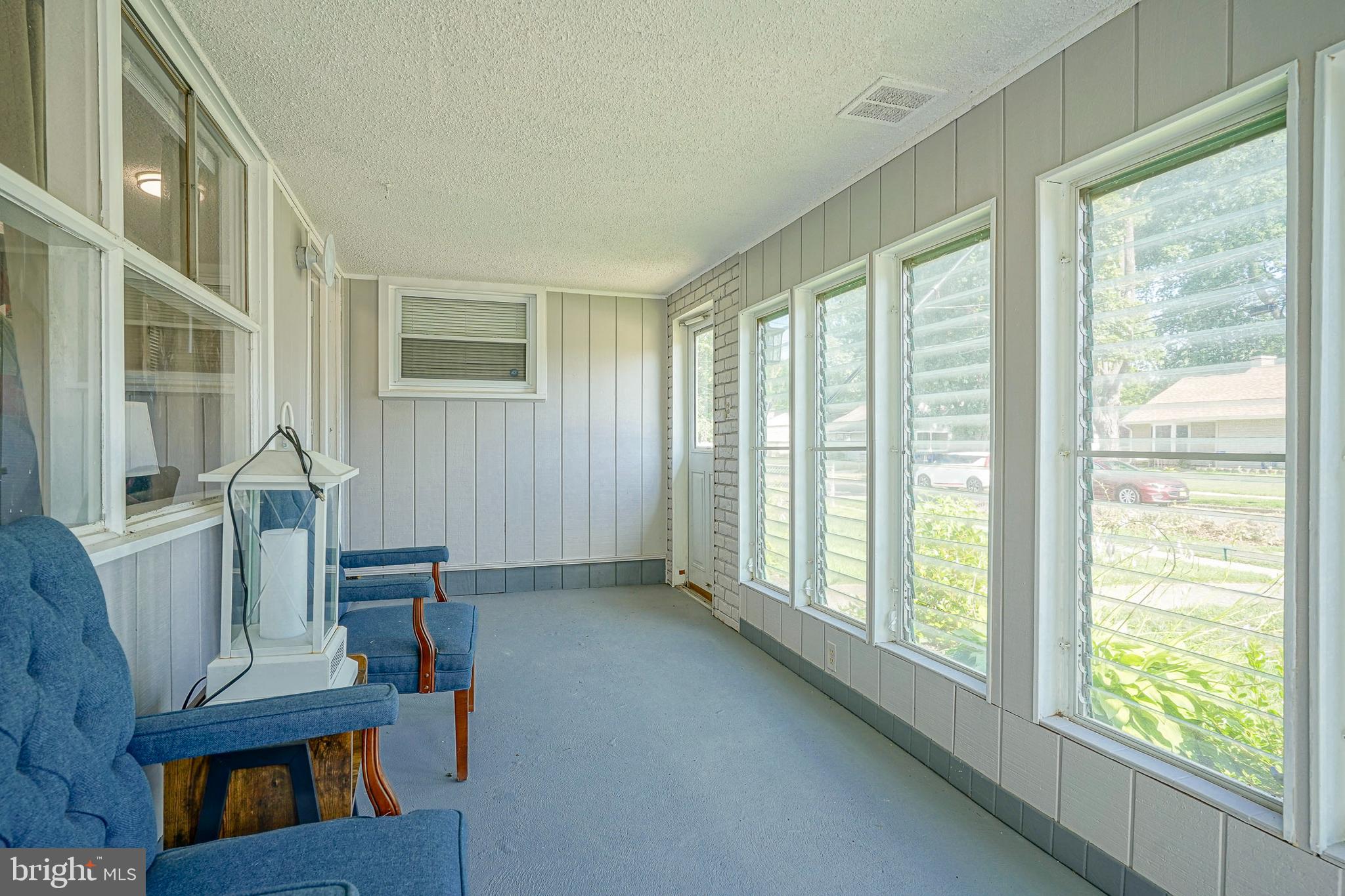 8 Rose Avenue Maple Shade, NJ 08052 - Photo 3 of 26 a view of an empty room with furniture and a window