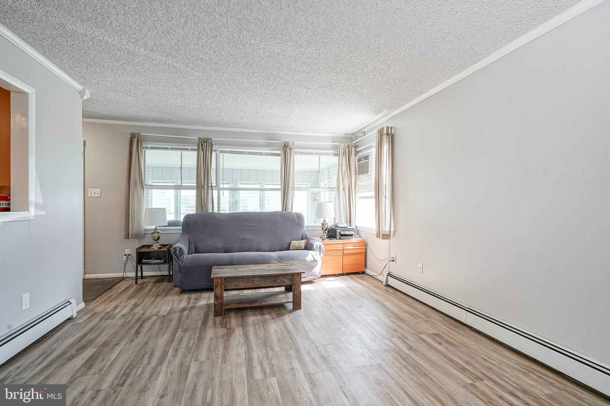 8 Rose Avenue Maple Shade, NJ 08052 - Photo 5 of 26 a living room with furniture and wooden floor