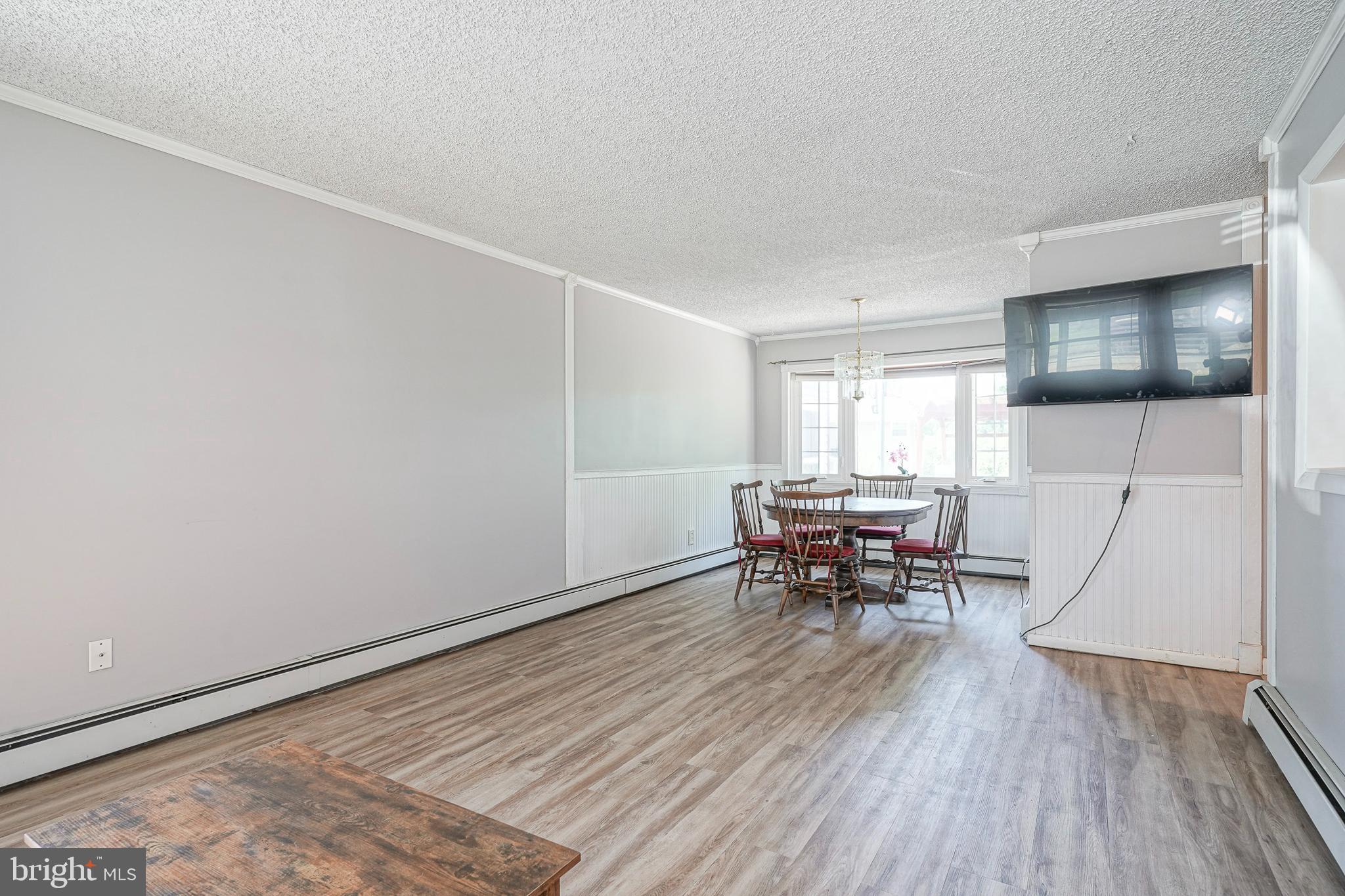 8 Rose Avenue Maple Shade, NJ 08052 - Photo 7 of 26 a living room with furniture and a table